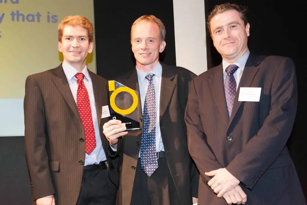 ByteSnap Directors Graeme Wintle (L) and Dunstan Power (C) collect the BEEA Consultancy of the Year Award